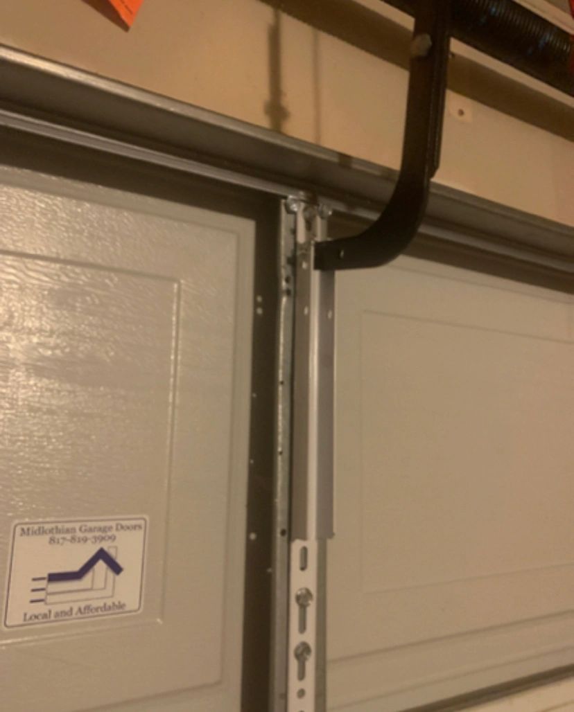 Garage door opener reinforcement bracket